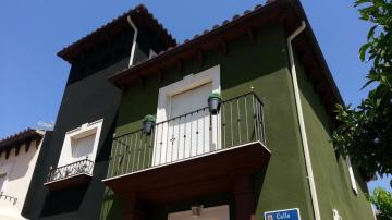 Fachada protegida con corcho proyectado